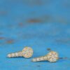 boucle d'oreille clé or jaune et diamants blancs or recyclé 18 carats puce sésame aupiho joaillerie