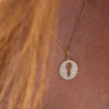 Key medal diamonds paved necklace yellow gold paved with white diamonds 18k recycled gold aupiho joaillerie
