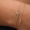 bracelet barrette cle or jaune et diamants blancs or recyclé 18 carats sesame aupiho joaillerie